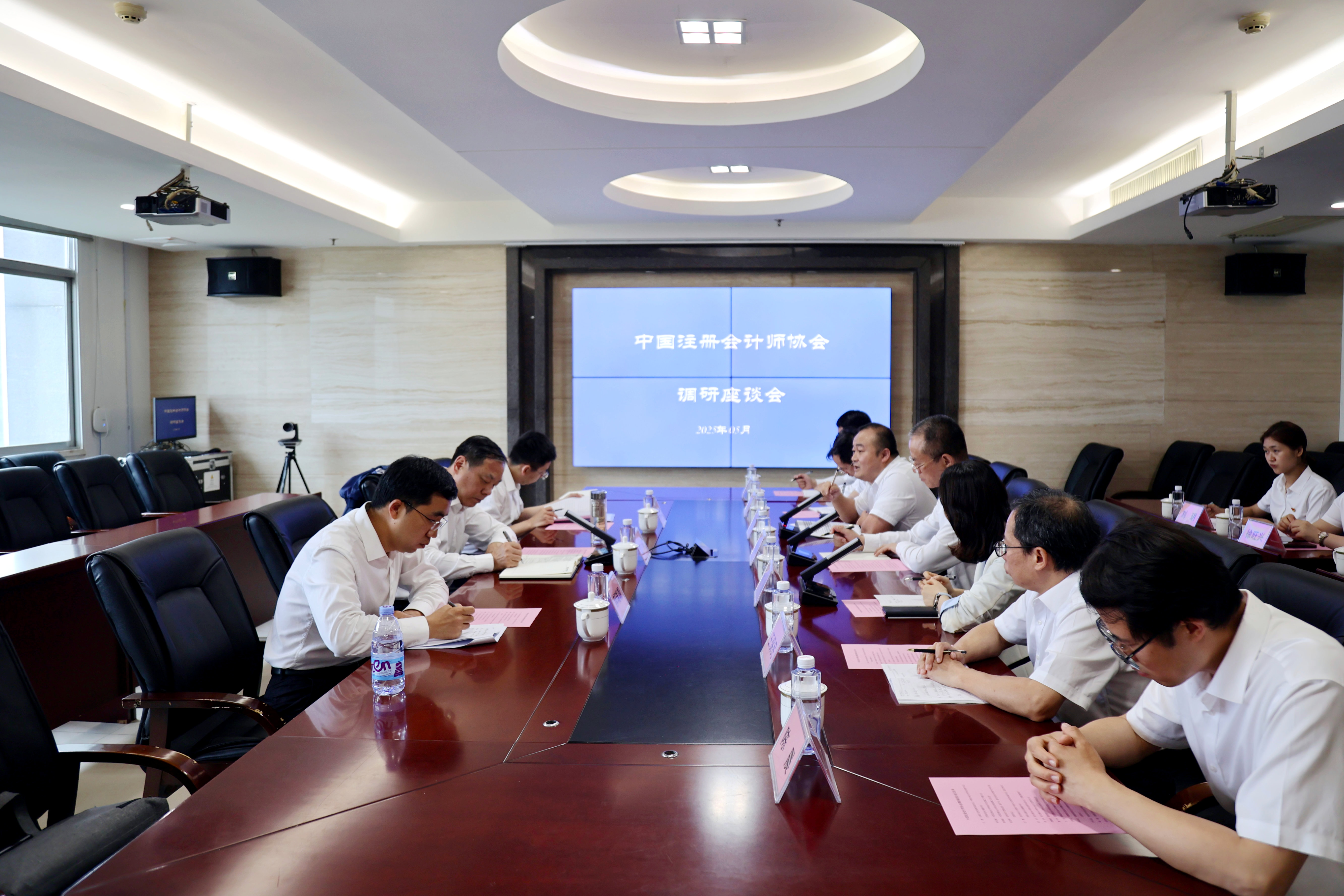 中注協秘書長江湧一行蒞臨湘能卓信調研